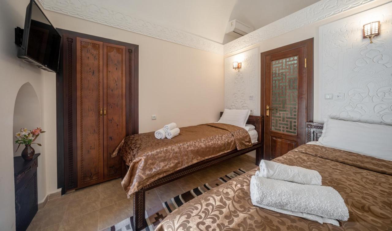 New Star Boutique Hotel - Madrasah Muhammad Mahram 1903 Khiva Esterno foto